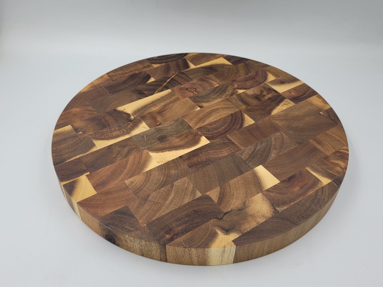 Thớt gỗ keo ghép kiểu Teak hình tròn D25H2.5 cm