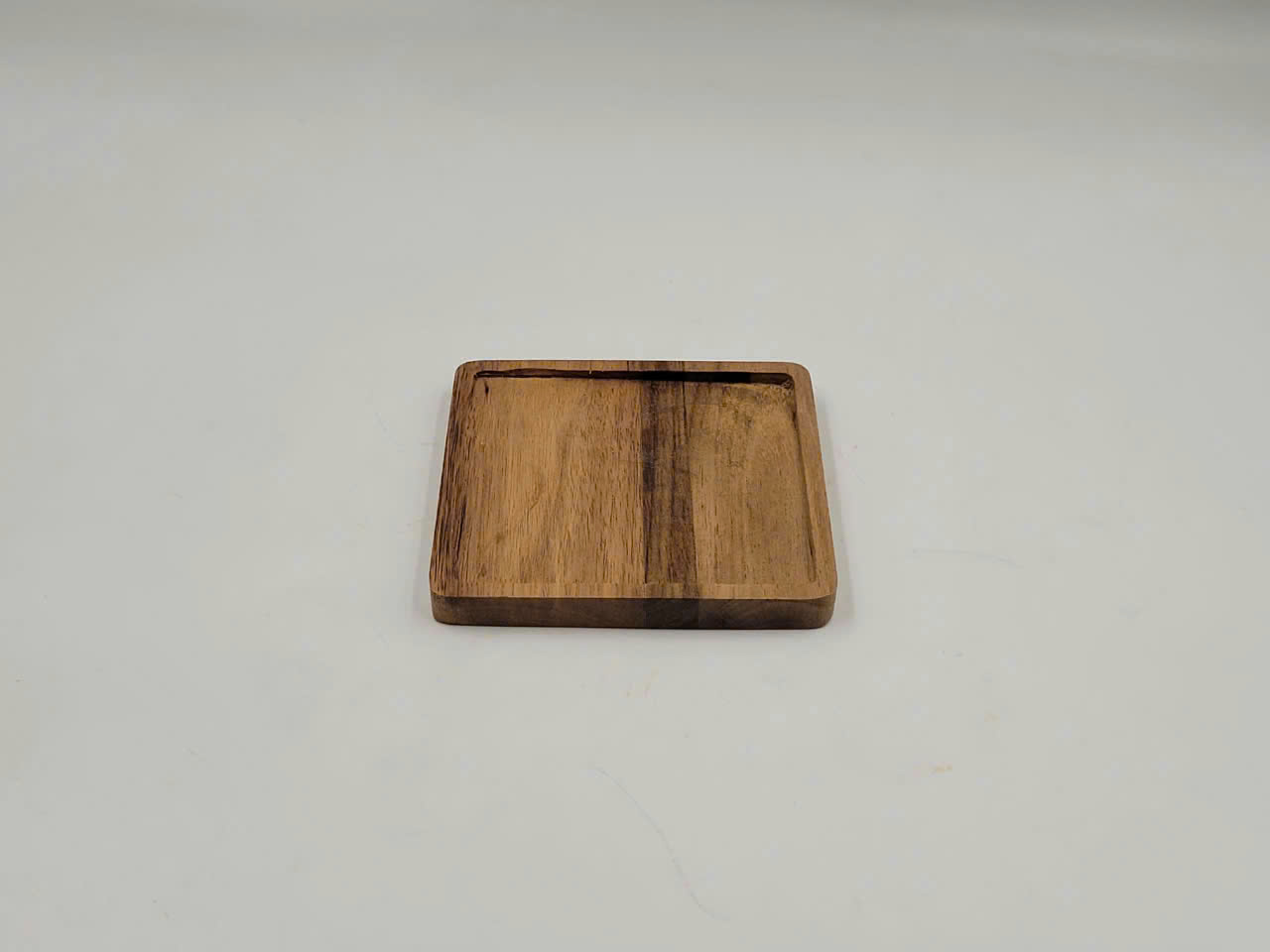 Lót ly gỗ keo hình bông hoa D9H1cm